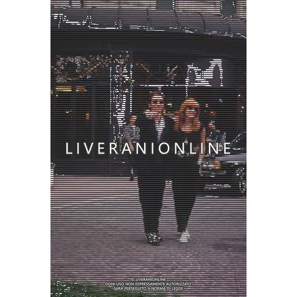 DIAP-RETROSPETTIVA BRUCE SPRINSTEEN CANTANTE NELLA FOTO BRUCE SPRINGSTEEN CON LA MOGLIE PATTY SCIALFA ALL\'HOTEL PRINCIPE DI SAVOIA A MILANO NELL\'ANNO 1990 AG ALDO LIVERANI SAS