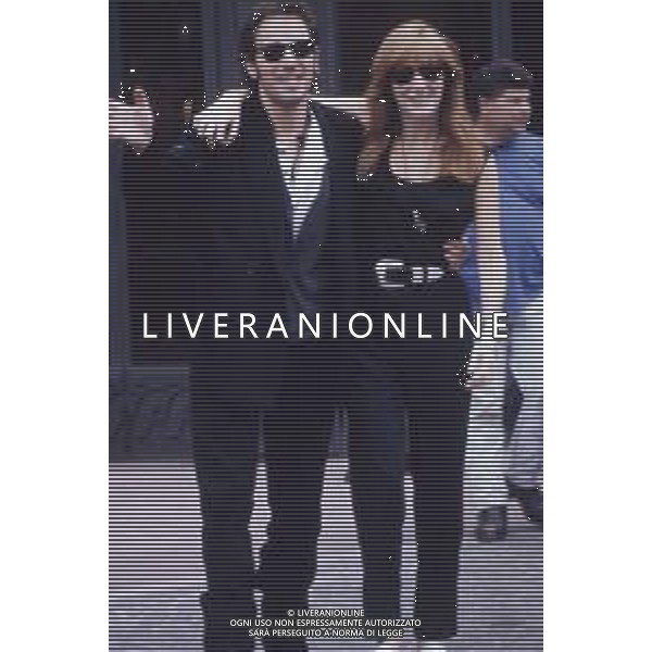 DIAP-RETROSPETTIVA BRUCE SPRINSTEEN CANTANTE NELLA FOTO BRUCE SPRINGSTEEN CON LA MOGLIE PATTY SCIALFA ALL\'HOTEL PRINCIPE DI SAVOIA A MILANO NELL\'ANNO 1990 AG ALDO LIVERANI SAS