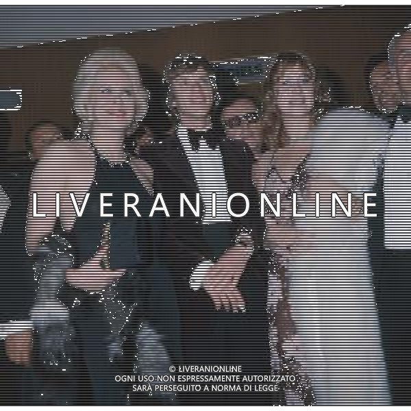 COL-RETROSPETTIVA MALCOM MCDOWELL ATTORE NELLA FOTO MALCOM MCDOWELL CON HELEN MIRREN A CANNES NELL\'ANNO 1973 AG ALDO LIVERANI SAS