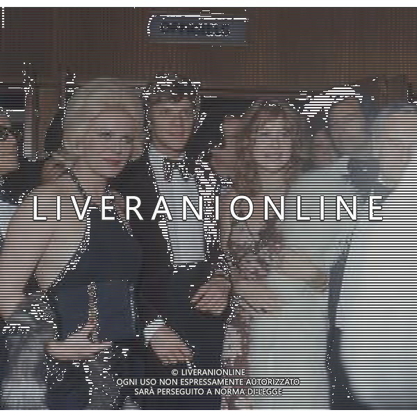 COL-RETROSPETTIVA MALCOM MCDOWELL ATTORE NELLA FOTO MALCOM MCDOWELL CON HELEN MIRREN A CANNES NELL\'ANNO 1973 AG ALDO LIVERANI SAS
