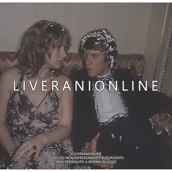 COL-RETROSPETTIVA MALCOM MCDOWELL ATTORE NELLA FOTO MALCOM MCDOWELL CON HELEN MIRREN A CANNES NELL\'ANNO 1973 AG ALDO LIVERANI SAS