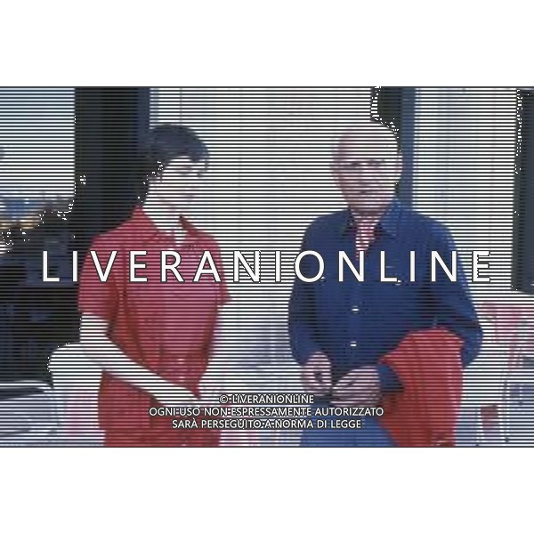 DIAP-RETROSPETTIVA ALBERTO MORAVIA SCRITTORE NELLA FOTO ALBERTO MORAVIA A VENEZIA NLL\'ANNO 1979 CON ISABELLA ROSSELLINI AG ALDO LIVERANI SAS 