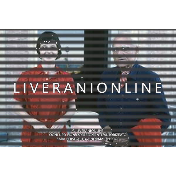 DIAP-RETROSPETTIVA ALBERTO MORAVIA SCRITTORE NELLA FOTO ALBERTO MORAVIA A VENEZIA NLL\'ANNO 1979 CON ISABELLA ROSSELLINI AG ALDO LIVERANI SAS 