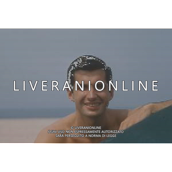 DIAP-RETROSPEETIVA GEORGE HAMILTON ATTORE NELLA FOTO GEORGE HAMILTON A CANNES NELL\'ANNO 1979 AG ALDO LIVERANI SAS