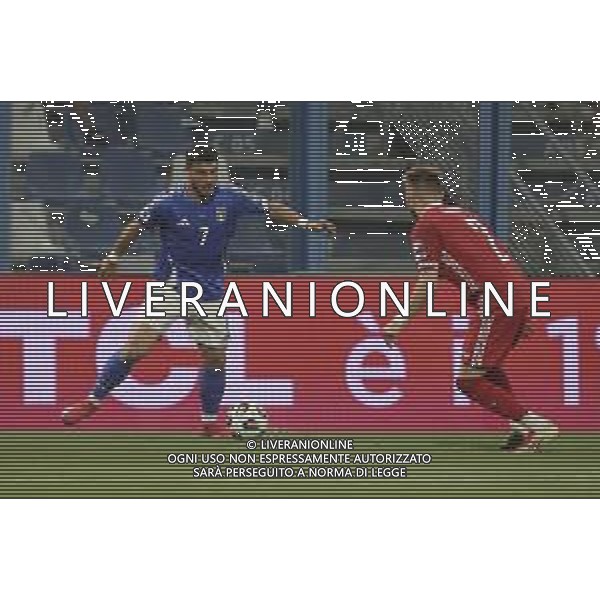 Riccardo Orsolini of Italy competes for the ball with Oleg Reabciuk of Moldova during Italy vs Moldova, European Qualifier, 2nd group match, game at Mapei Stadium - Città del Tricolore in Reggio nell\'Emilia (RE), Italy, on June 09, 2025. (Photo by Davide Casentini)- AGENZIA ALDO LIVERANI SAS