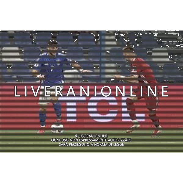 Riccardo Orsolini of Italy competes for the ball with Oleg Reabciuk of Moldova during Italy vs Moldova, European Qualifier, 2nd group match, game at Mapei Stadium - Città del Tricolore in Reggio nell\'Emilia (RE), Italy, on June 09, 2025. (Photo by Davide Casentini)- AGENZIA ALDO LIVERANI SAS