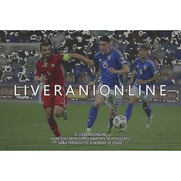 Alessandro Bastoni of Italy battle for the ball with Vladislav Baboglo of Moldova during Italy vs Moldova, European Qualifier, 2nd group match, game at Mapei Stadium - Città del Tricolore in Reggio nell\'Emilia (RE), Italy, on June 09, 2025. (Photo by Davide Casentini)- AGENZIA ALDO LIVERANI SAS