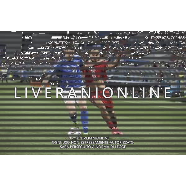 Alessandro Bastoni of Italy battle for the ball with Virgiliu Postolachi of Moldova during Italy vs Moldova, European Qualifier, 2nd group match, game at Mapei Stadium - Città del Tricolore in Reggio nell\'Emilia (RE), Italy, on June 09, 2025. (Photo by Davide Casentini)- AGENZIA ALDO LIVERANI SAS