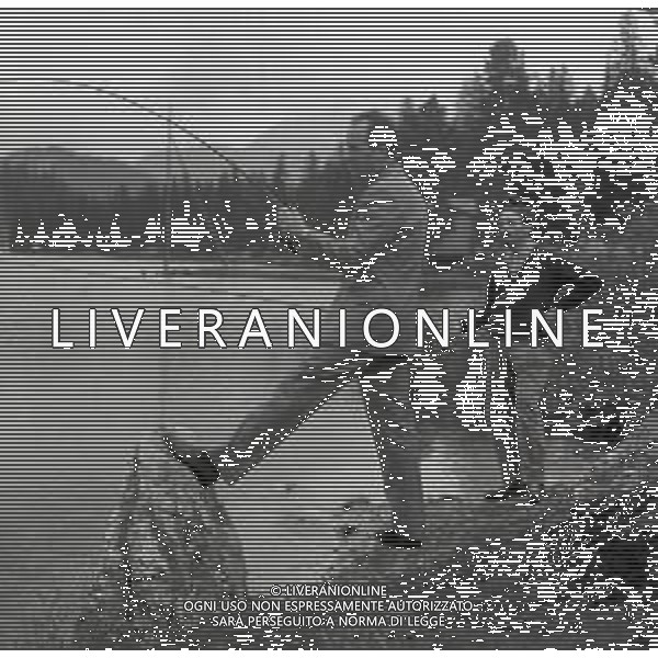 NEG-RETROSPETTIVA NICO FIDENCO CANTANTE NELLA FOTO NICO FIDENCO AL LAGO DI MISURINA NELL\'ANNO 1964 FOTO CESARE AMADORI-AG ALDO LIVERANI SAS