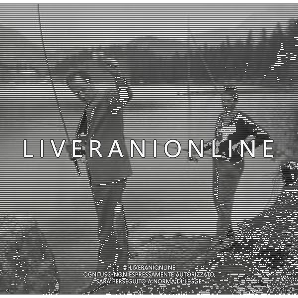 NEG-RETROSPETTIVA NICO FIDENCO CANTANTE NELLA FOTO NICO FIDENCO AL LAGO DI MISURINA NELL\'ANNO 1964 FOTO CESARE AMADORI-AG ALDO LIVERANI SAS