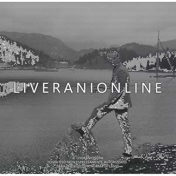 NEG-RETROSPETTIVA NICO FIDENCO CANTANTE NELLA FOTO NICO FIDENCO AL LAGO DI MISURINA NELL\'ANNO 1964 FOTO CESARE AMADORI-AG ALDO LIVERANI SAS