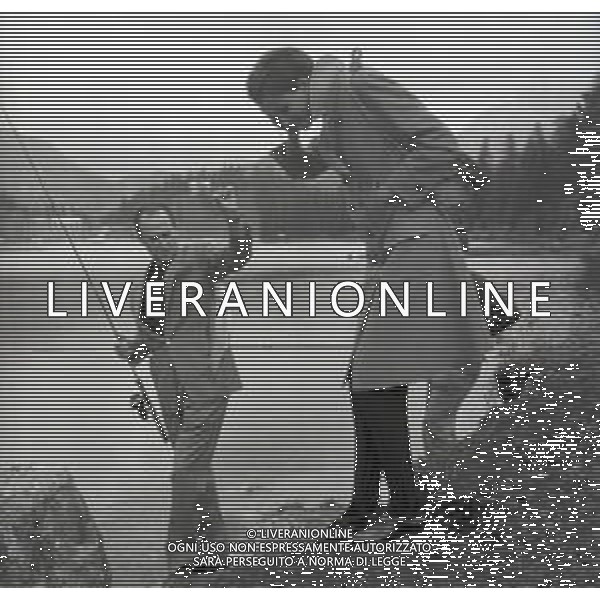 NEG-RETROSPETTIVA NICO FIDENCO CANTANTE NELLA FOTO NICO FIDENCO AL LAGO DI MISURINA NELL\'ANNO 1964 FOTO CESARE AMADORI-AG ALDO LIVERANI SAS