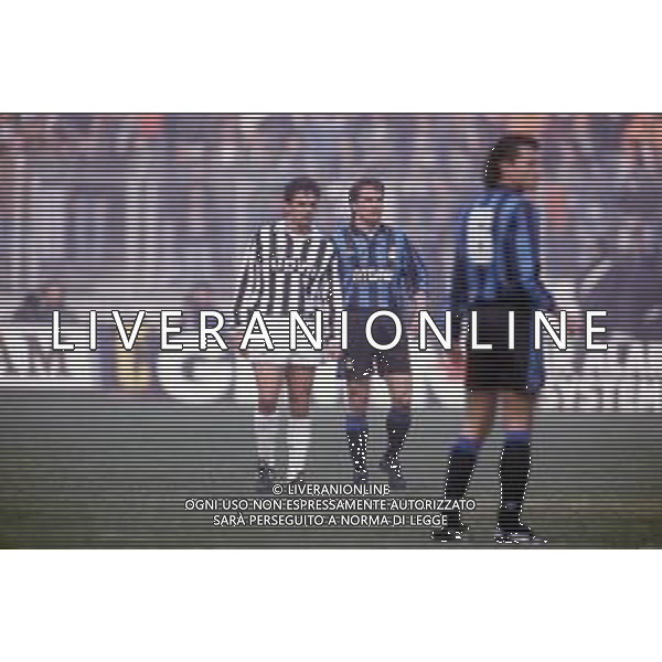 DIAP-RETROSPETTIVA ROBERTO BAGGIO CALCIATORE NELLA FOTO ROBERTO BAGGIO CON LA MAGLIA DELLA JUVENTUS NELL\'ANNO 1991 E LOTHAR MATTHAUS AG ALDO LIVERANI SAS