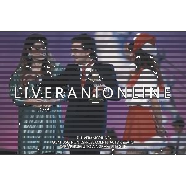 DIAP-RETROSPETTIVA ALBANO CARRISI E ROMINA POWER CANTANTI NELLA FOTO ROMINA POWER E ALBANO CARRISI NELLA TRASMISSIONE TELEVISIVA “BUON NATALE“ NELL\'ANNO 1991 AG ALDO LIVERANI SAS
