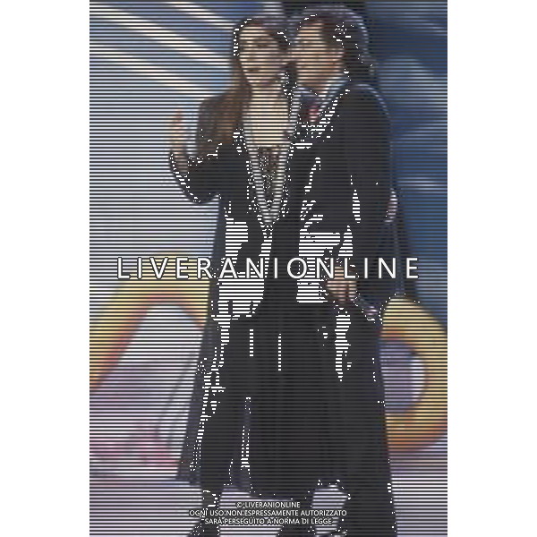 DIAP-RETROSPETTIVA ALBANO CARRISI E ROMINA POWER CANTANTI NELLA FOTO ROMINA POWER E ALBANO CARRISI NELLA TRASMISSIONE TELEVISIVA “BUON NATALE“ NELL\'ANNO 1991 AG ALDO LIVERANI SAS