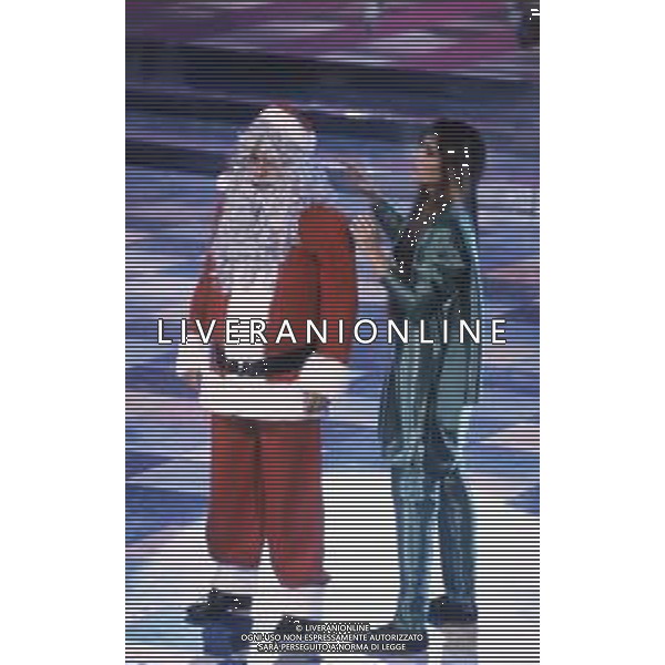DIAP-RETROSPETTIVA ALBANO CARRISI E ROMINA POWER CANTANTI NELLA FOTO ROMINA POWER E ALBANO CARRISI NELLA TRASMISSIONE TELEVISIVA “BUON NATALE“ NELL\'ANNO 1991 AG ALDO LIVERANI SAS