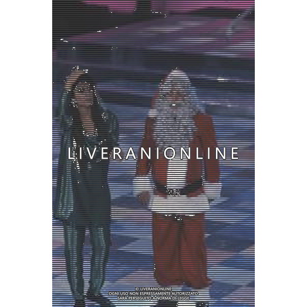 DIAP-RETROSPETTIVA ALBANO CARRISI E ROMINA POWER CANTANTI NELLA FOTO ROMINA POWER E ALBANO CARRISI NELLA TRASMISSIONE TELEVISIVA “BUON NATALE“ NELL\'ANNO 1991 AG ALDO LIVERANI SAS