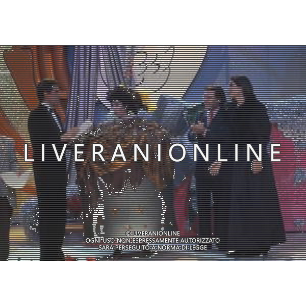 DIAP-RETROSPETTIVA ALBANO CARRISI E ROMINA POWER CANTANTI NELLA FOTO ROMINA POWER E ALBANO CARRISI NELLA TRASMISSIONE TELEVISIVA “BUON NATALE“ NELL\'ANNO 1991 AG ALDO LIVERANI SAS
