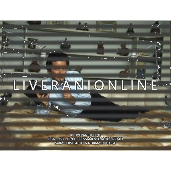 COL- RETROSPETTIVA GIOVANNI BELFIORE PAROLIERE E PRODUTTORE DISCOGRAFICO NELLA FOTO GIANNI BELFIORE NELLA SUA ABITAZIONE NELL’ANNO 1982 THEMA - AGENZIA ALDO LIVERANI SAS