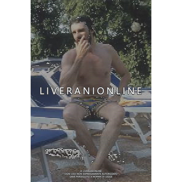 DIAP-RETROSPETTIVA RICKY TOGNAZZI ATTORE NELLA FOTO RICKY TOGNAZZI IN PISCINA FOTO MARIO DOTTI-AG ALDO LIVERANI SAS 
