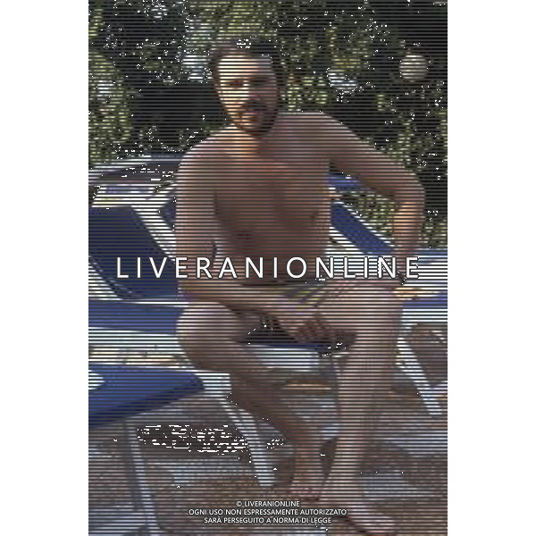 DIAP-RETROSPETTIVA RICKY TOGNAZZI ATTORE NELLA FOTO RICKY TOGNAZZI IN PISCINA FOTO MARIO DOTTI-AG ALDO LIVERANI SAS 