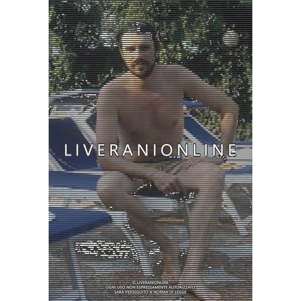 DIAP-RETROSPETTIVA RICKY TOGNAZZI ATTORE NELLA FOTO RICKY TOGNAZZI IN PISCINA FOTO MARIO DOTTI-AG ALDO LIVERANI SAS 