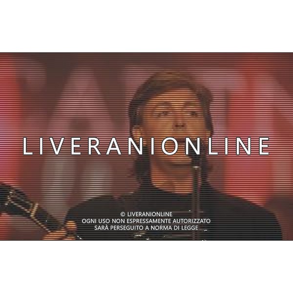 DIAP-RETROSPETIIVA PAUL MC CARTNEY CANTANTE NELLA FOTO PAUL MC CARTNEY AL FESTIVAL DI SANREMO NELL\'ANNO 1988 AG ALDO LIVERANI SAS