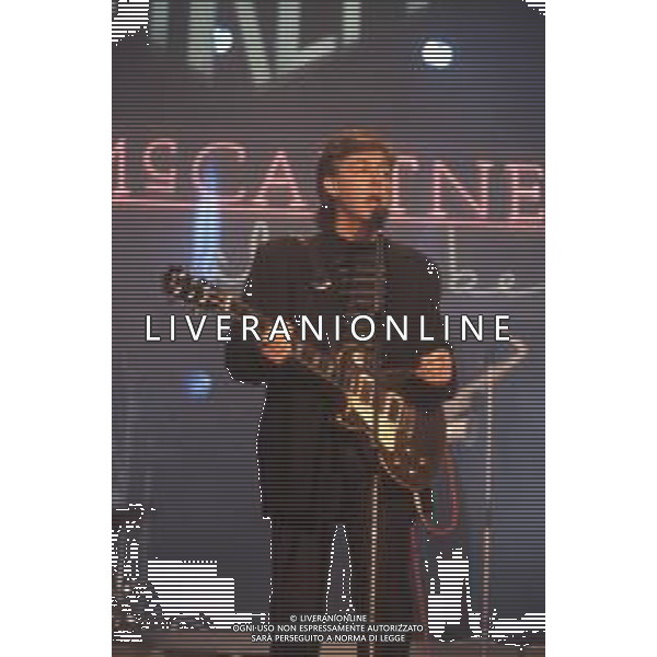 DIAP-RETROSPETIIVA PAUL MC CARTNEY CANTANTE NELLA FOTO PAUL MC CARTNEY AL FESTIVAL DI SANREMO NELL\'ANNO 1988 AG ALDO LIVERANI SAS