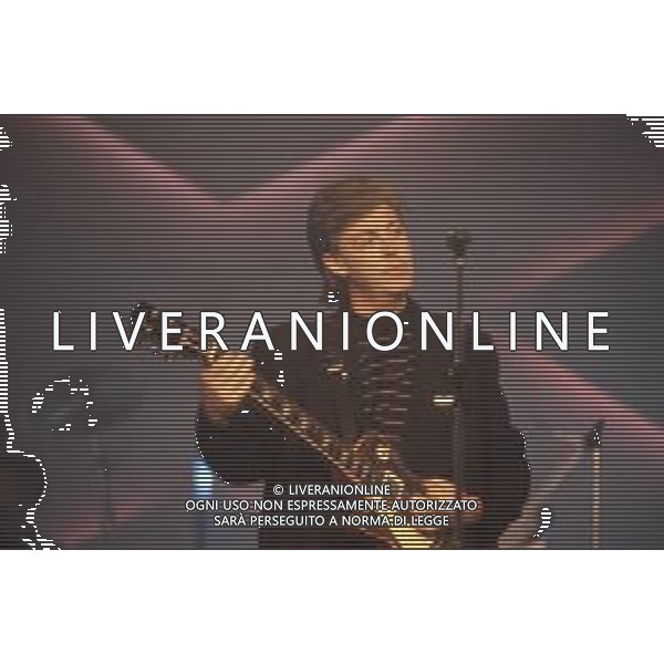DIAP-RETROSPETIIVA PAUL MC CARTNEY CANTANTE NELLA FOTO PAUL MC CARTNEY AL FESTIVAL DI SANREMO NELL\'ANNO 1988 AG ALDO LIVERANI SAS