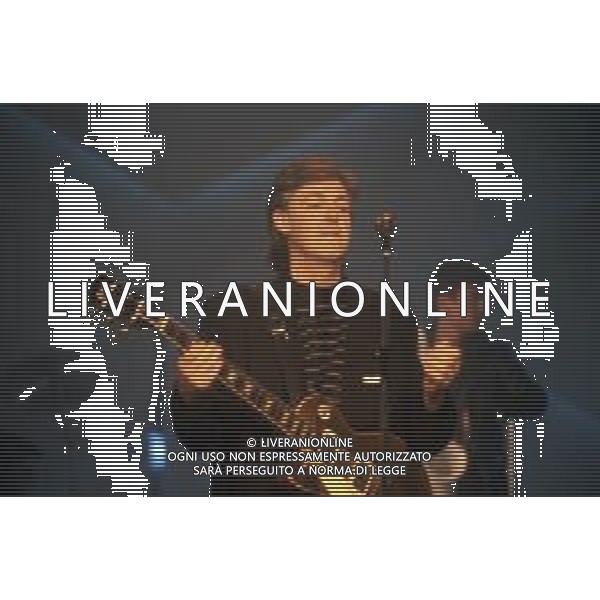 DIAP-RETROSPETIIVA PAUL MC CARTNEY CANTANTE NELLA FOTO PAUL MC CARTNEY AL FESTIVAL DI SANREMO NELL\'ANNO 1988 AG ALDO LIVERANI SAS