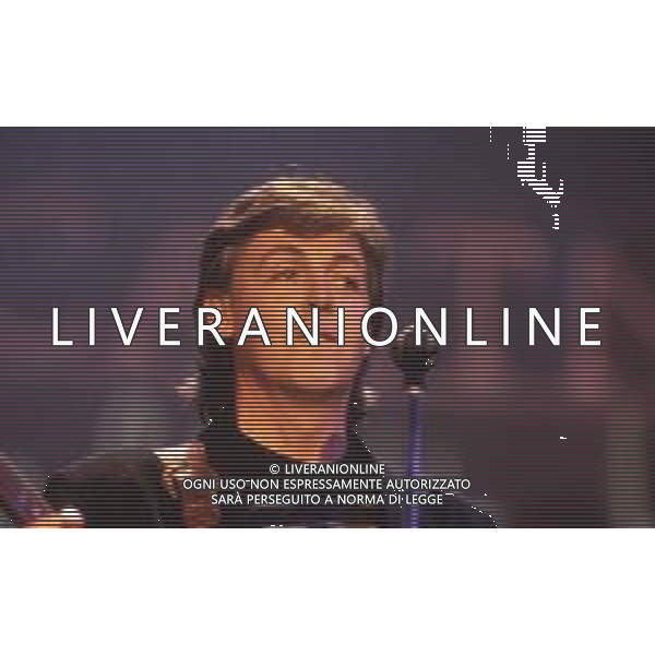 DIAP-RETROSPETIIVA PAUL MC CARTNEY CANTANTE NELLA FOTO PAUL MC CARTNEY AL FESTIVAL DI SANREMO NELL\'ANNO 1988 AG ALDO LIVERANI SAS