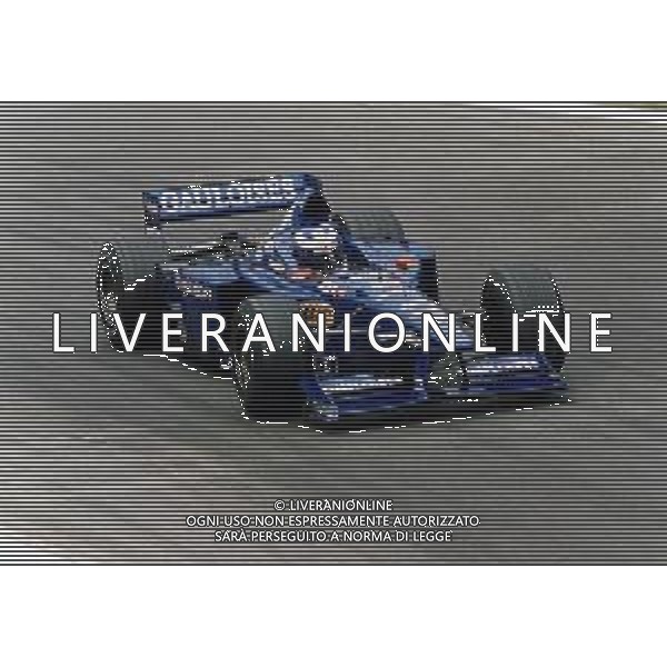 ST-RETROSPETTIVA JARNO TRULLI PILOTA F1 NELLA FOTO JARNO TRULLI CON LA PEUGEOT-PROST NELL\'ANNO 1998 AG CONTROLUCE-AG ALDO LIVERANI SAS 