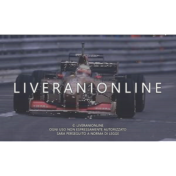 DIAP-RETROSPETTIVA MARTIN BRUNDLE PILOTA F1 NELLA FOTO MARTIN BRUNDLE NELL\'ANNO 1996 AG CONTROLUCE-AG ALDO LIVERANI SAS