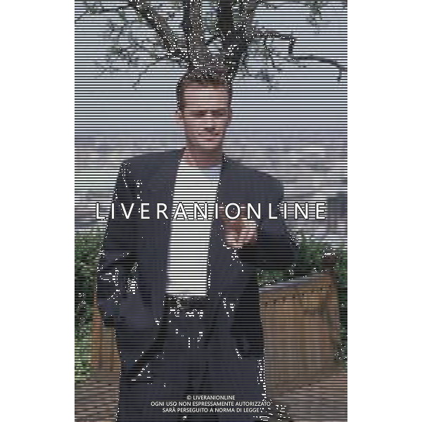 DIAP-RETROSPETTIVA LUKE PERRY ATTORE NELLA FOTO LUKE PERRY A MILANO IN TERRAZZA MARTINI NELL\'ANNO 1995 AG ALDO LIVERANI SAS