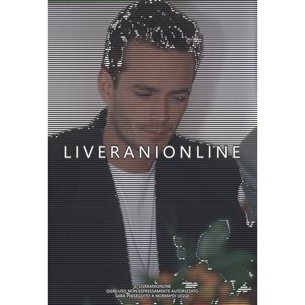 DIAP-RETROSPETTIVA LUKE PERRY ATTORE NELLA FOTO LUKE PERRY A MILANO IN TERRAZZA MARTINI NELL\'ANNO 1995 AG ALDO LIVERANI SAS