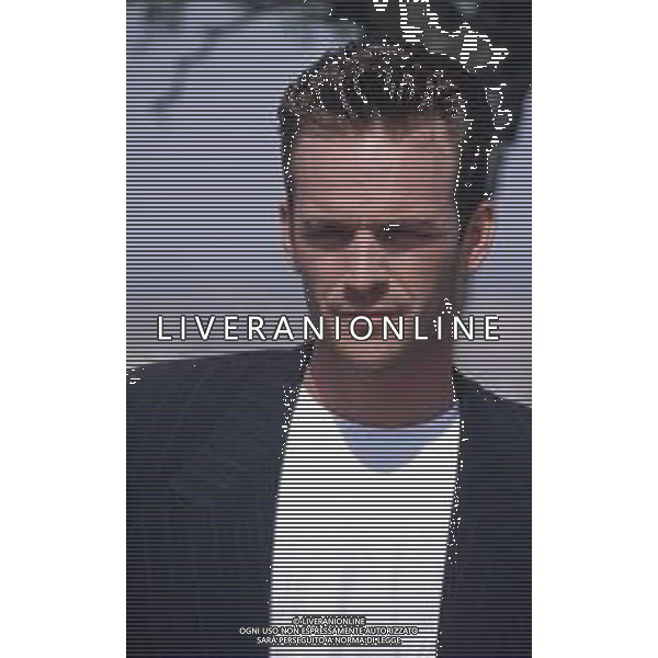 DIAP-RETROSPETTIVA LUKE PERRY ATTORE NELLA FOTO LUKE PERRY A MILANO IN TERRAZZA MARTINI NELL\'ANNO 1995 AG ALDO LIVERANI SAS