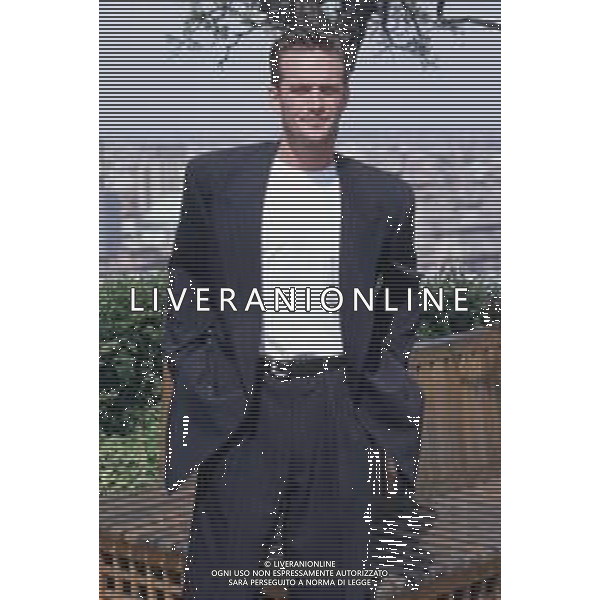 DIAP-RETROSPETTIVA LUKE PERRY ATTORE NELLA FOTO LUKE PERRY A MILANO IN TERRAZZA MARTINI NELL\'ANNO 1995 AG ALDO LIVERANI SAS