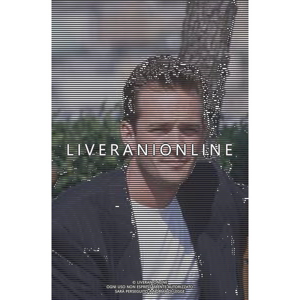 DIAP-RETROSPETTIVA LUKE PERRY ATTORE NELLA FOTO LUKE PERRY A MILANO IN TERRAZZA MARTINI NELL\'ANNO 1995 AG ALDO LIVERANI SAS