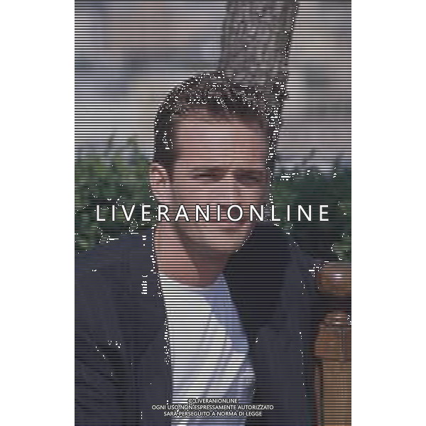 DIAP-RETROSPETTIVA LUKE PERRY ATTORE NELLA FOTO LUKE PERRY A MILANO IN TERRAZZA MARTINI NELL\'ANNO 1995 AG ALDO LIVERANI SAS