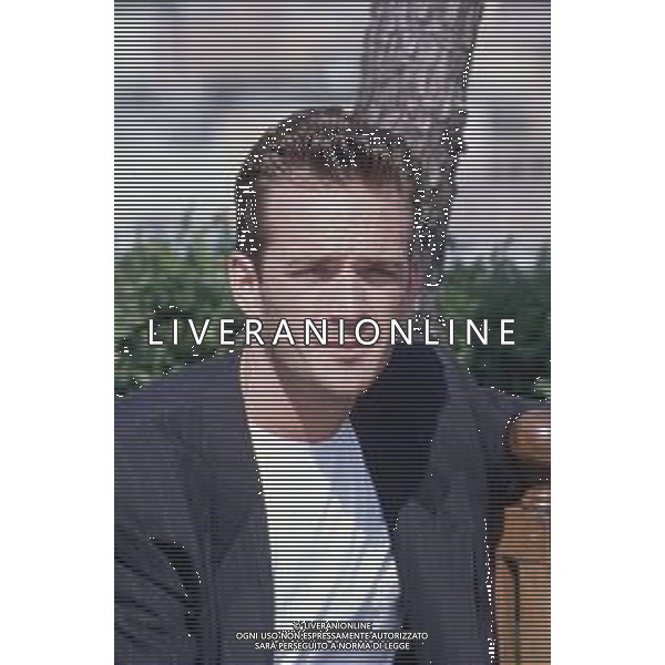 DIAP-RETROSPETTIVA LUKE PERRY ATTORE NELLA FOTO LUKE PERRY A MILANO IN TERRAZZA MARTINI NELL\'ANNO 1995 AG ALDO LIVERANI SAS