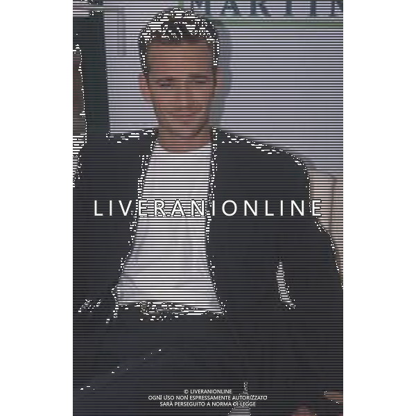 DIAP-RETROSPETTIVA LUKE PERRY ATTORE NELLA FOTO LUKE PERRY A MILANO IN TERRAZZA MARTINI NELL\'ANNO 1995 AG ALDO LIVERANI SAS