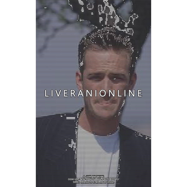 DIAP-RETROSPETTIVA LUKE PERRY ATTORE NELLA FOTO LUKE PERRY A MILANO IN TERRAZZA MARTINI NELL\'ANNO 1995 AG ALDO LIVERANI SAS