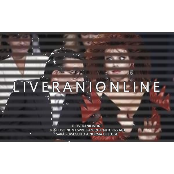 DIAP-RETROSPETTIVA CARMEN RUSSO ATTRICE NELLA FOTO CARMEN RUSSO NELLA TRASMISSIONE TELEVISIVA “UN FANTASTICO TRAGICO VENERDI\'“ NELL\'ANNO 1986-1987 AG ALDO LIVERANI SAS