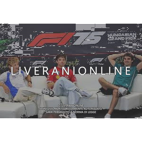 (L to R): Liam Lawson (NZL) Racing Bulls; Charles Leclerc (MON) Ferrari; and Lance Stroll (CDN) Aston Martin F1 Team, in the FIA Press Conference. 31.07.2025. Formula 1 World Championship, Rd 14, Hungarian Grand Prix, Budapest, Hungary, Preparation Day. - www.xpbimages.com, EMail: requests@xpbimages.com © Copyright: Bearne / XPB Images only italy-ag aldo liverani sas