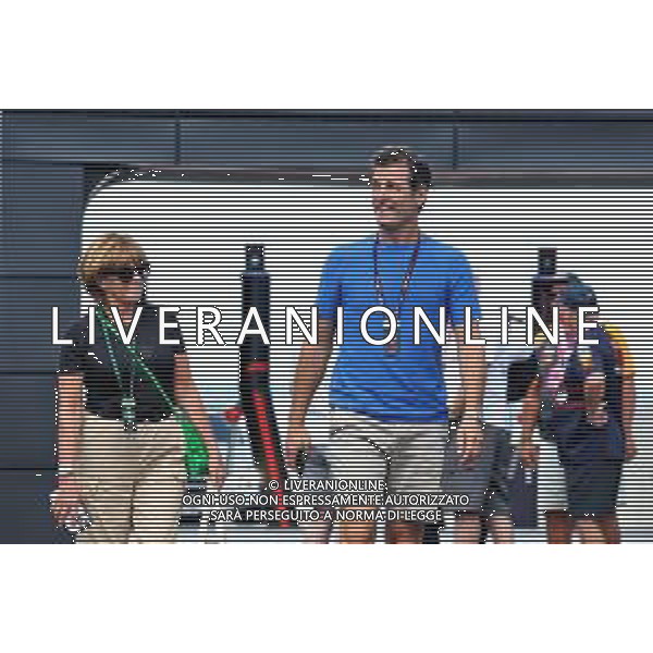 (L to R): Ann Neal (GBR) with her husband Mark Webber (AUS) Channel 4 Presenter / Driver Manager. 01.08.2025. Formula 1 World Championship, Rd 14, Hungarian Grand Prix, Budapest, Hungary, Practice Day. - www.xpbimages.com, EMail: requests@xpbimages.com © Copyright: Bearne / XPB Images only italy-ag aldo liverani sas