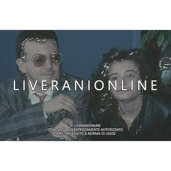 DIAP-RETROSPETTIVA ENRICO RUGGERI CANTANTE NELLA FOTO ENRICO RUGGERI CON LA MOGLIE A TERRAZZA MARTINI MILANO NELL\'ANNO 1987 AG ALDO LIVERANI SAS