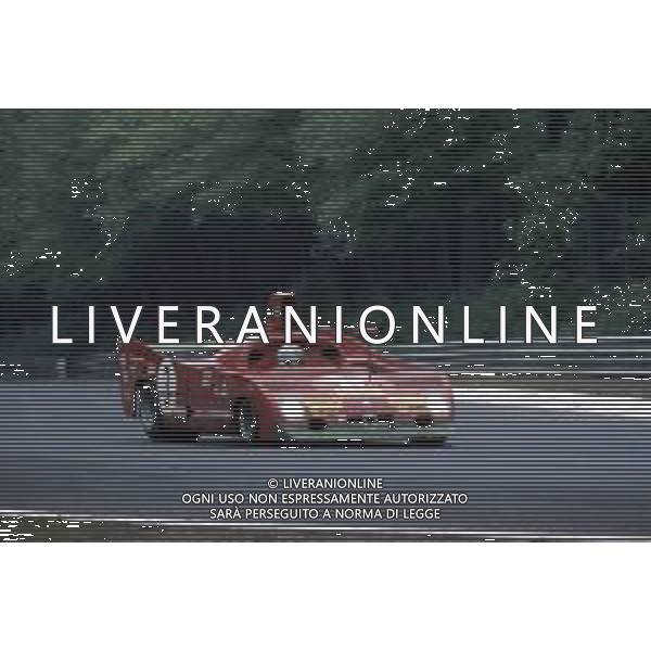 DIAP-RETROSPETTIVA MARIO ANDRETTI PILOTA NELLA FOTO MARIO ANDRETTI CON ALFA ROMEO AG ALDO LIVERANI SAS