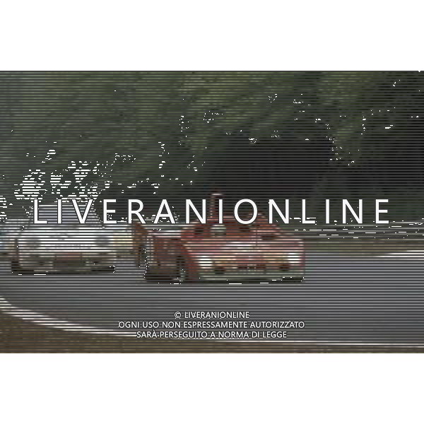 DIAP-RETROSPETTIVA MARIO ANDRETTI PILOTA NELLA FOTO MARIO ANDRETTI CON ALFA ROMEO AG ALDO LIVERANI SAS