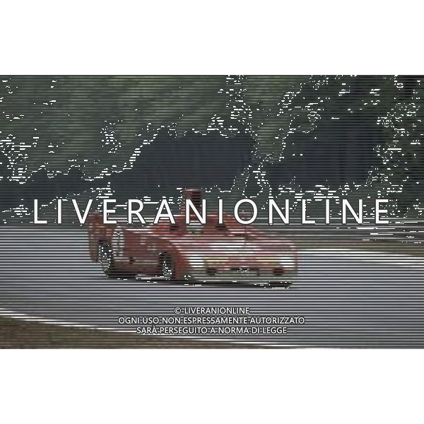 DIAP-RETROSPETTIVA MARIO ANDRETTI PILOTA NELLA FOTO MARIO ANDRETTI CON ALFA ROMEO AG ALDO LIVERANI SAS
