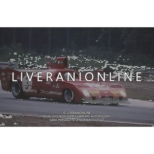 DIAP-RETROSPETTIVA MARIO ANDRETTI PILOTA NELLA FOTO MARIO ANDRETTI CON ALFA ROMEO AG ALDO LIVERANI SAS